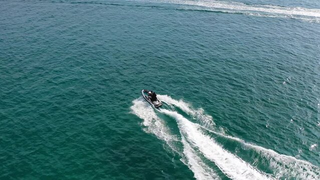 AH - Jetski in Tropical Ocean and Beautiful Island 02