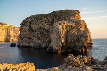 General view of Fungus Rock in Dwejra Bay on the island of Gozo, also known in Maltese as Hagret il-General (the General's Rock) on 17 May 2022 - Powered by Adobe