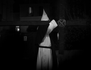 Portrait of a penitent wearing a capirote in Sorrento, IT during Easter procession 