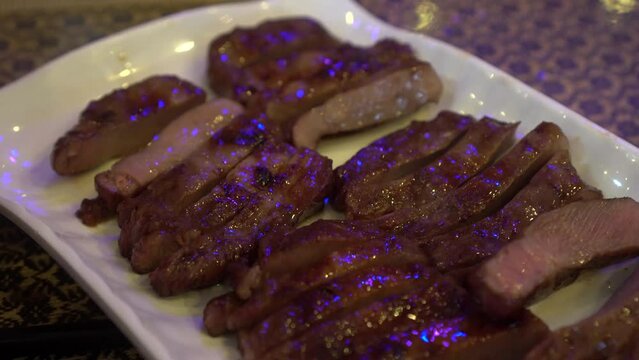 Grill pork neck barbecue fat juicy part slice marinated in Thai syle sauce