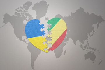 puzzle heart with the national flag of ukraine and republic of the congo on a world map background. Concept.