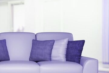 Photo toned in pantone color of the year 2022 very peri. Cozy violet sofa.
