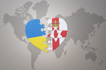 puzzle heart with the national flag of ukraine and northern ireland on a world map background. Concept.