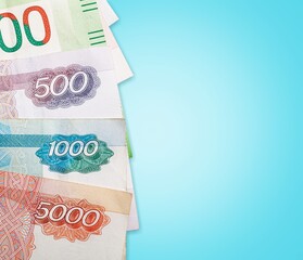 Russian rubles on a background. Currency exchange. Financial crisis, ruble devaluation concept.