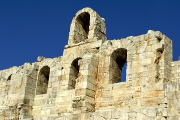 Arched openings in an ancient stone wall in Athens, Greece