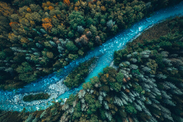 Drone aerial top view of montain river and forest
