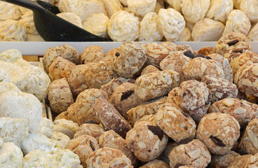 Fototapeta na wymiar background of biscuits made with toasted almond flour for sale in the pastry stall