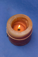 big orange candle burning