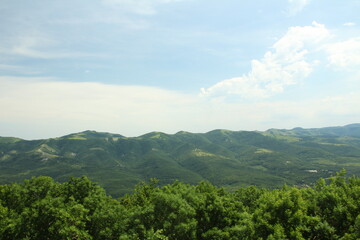 landscape with mountains and clouds