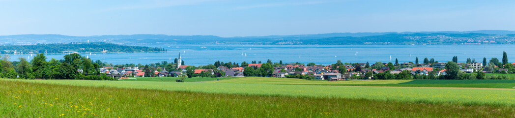 Fototapeta na wymiar Panorama of village Scherzingen in Switzerland with lake Constance