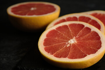 Fototapeta na wymiar slices of cut grayfruit close-up