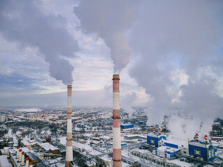 Industrial factory smokestack emission smoke from natural gas in atmosphere. Industry zone, factory...