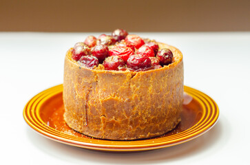British pork pie topped with whole cranberries and  a rich ruby port jelly