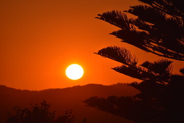 Fototapeta na wymiar Sunset over the mountains in Corfu, Greece