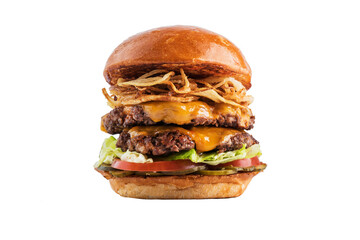 Delicious double burger with beef, golden fried onions, cucumbers and tomatoes. isolated
