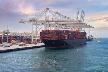 Cargo vessel at container terminal