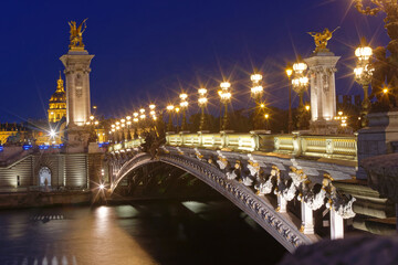 The famous Alexandre III bridge at night, Paris, France