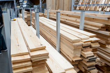 Lumber is sold in a store for construction and repair