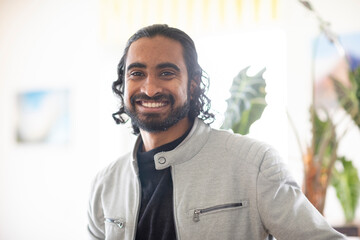 Portrait of smiling creative professional in office