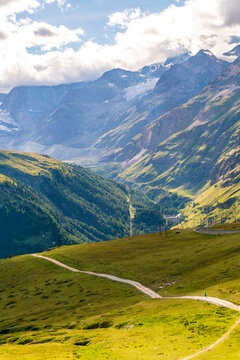 Switzerland, Valais, Road in mountain landscape