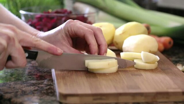 Chopping Peeled Potates