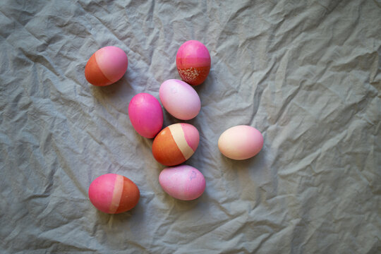 colourful Easter eggs on grey fabric