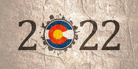 2022 year number with industrial icons around zero digit. Flag of Colorado.
