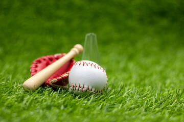 Baseball is on green grass