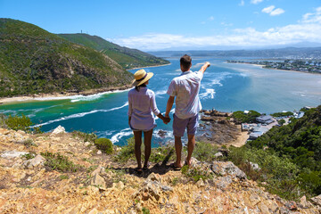 A panoramic view of the lagoon of Knysna, South Africa. beach in Knysna, Western Cape, South Africa. couple man and woman on a trip at the garden route 
