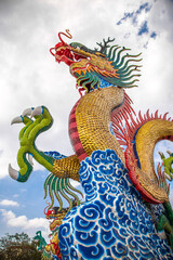 Golden dancing Dragon in Suan Sawan, or Paradise Park in Nakhon Sawan, Thailand