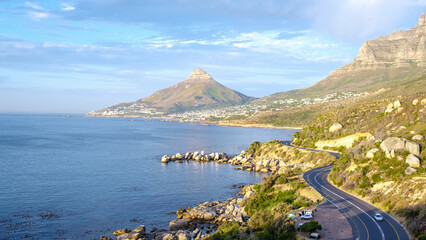 The Chapman's Peak Drive on the Cape Peninsula near Cape Town in South Africa on a bright and sunny afternoon Cape Town, road trip Chapman's peak drive - obrazy, fototapety, plakaty