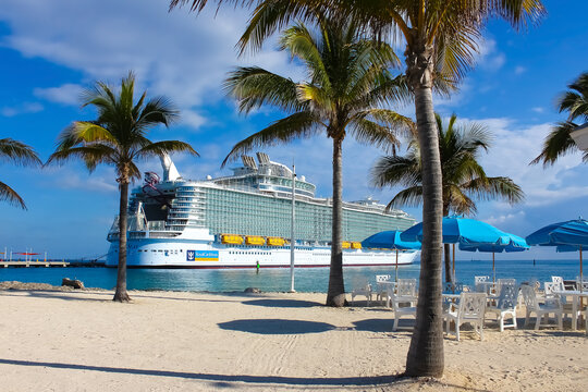 Coco Cay, Bahamas - April 29, 2022: Symphony of the seas is the biggest cruise ship, docked in Cococay, the private island post that's owned by the Royal Caribbean cruise line