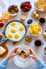 Cheesecakes on a white table. Cheesecakes with berries and honey. Beautiful breakfast. Food day. Dinner. Buffet. Breakfast on the table top view.Food on the table top view.Muesli with berries. Fried 