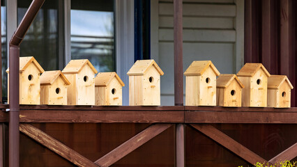 Obraz na płótnie Canvas wooden birdhouses on sale