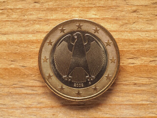 1 Euro coin showing federal eagle, currency of Germany, EU