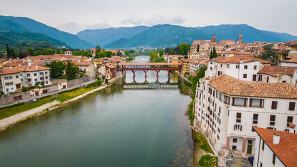 Naklejka na ściany i meble Aerial View of the Alpini Bridge with the Brenta River in Bassano del Grappa, Vicenza, Veneto, Italy, Europe