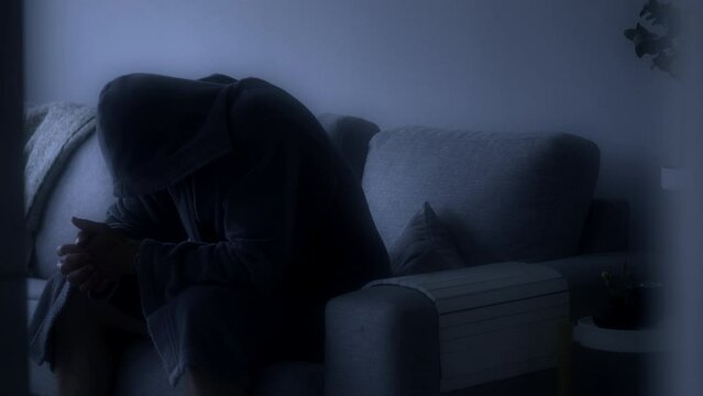 Man with insomnia awake at night, sleeplessness concept