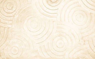 Fototapeta na wymiar Cream concrete texture pattern circle for background. Floor stamped concrete abstract on walkway in garden.