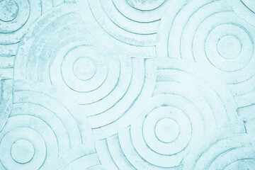 Fototapeta na wymiar Blue concrete texture pattern circle for background. Floor stamped concrete abstract on walkway in garden.
