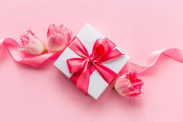 Fift box with pink ribbon. Women mothers day concept