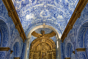 blue azulejos on wall and on the ceiling inside the Church of Sao Lourenço in Almancil, Algarve,...