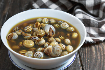 Snails tapa - Andalusia Traditional food on Wooden