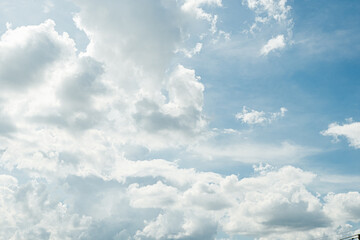 white fluffy clouds on sky