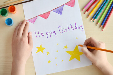 Childrens pencil drawing. Happy Birthday. Greeting card with yellow stars.