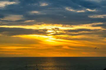 The sun is falling in sunset time at Promthep Cape in Phuket, Thailand.