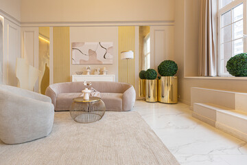 the latest fashion home trends in an ultra modern elegant interior of a cozy studio in soft pastel colors. close-ups of a stylish living area with golden elements