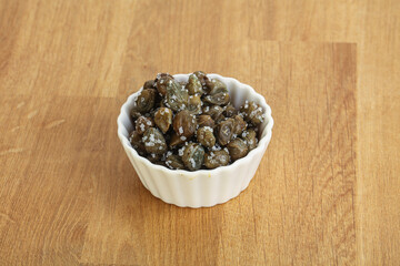 Salted marinated capers snack appetiser