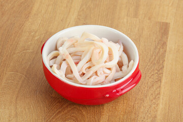 Marinated squid strips in the bowl