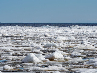 Melting ice floes on the surface of the water in Ladoga Lake in the Republic of Karelia, northwest Russia, in May