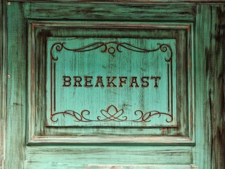 Obraz premium Signboard for a shop or cafe, breakfast. Rustic style boardof green color